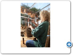 Norah Kennedy making traditional baskets from willow in her workshop in the Stroud Valley Gloucestershire
