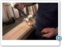 Cricket Bat Maker Tim Kelly making cricket bats from willow wood in his workshop at Ashburnham Sussex England
